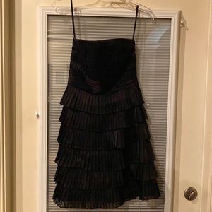 White House Black Market never worn pretty little black dress in size 00.